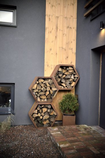 Holzlager Kaminholzlager Cortenstahl sechseckig stapelbar Wandmontage